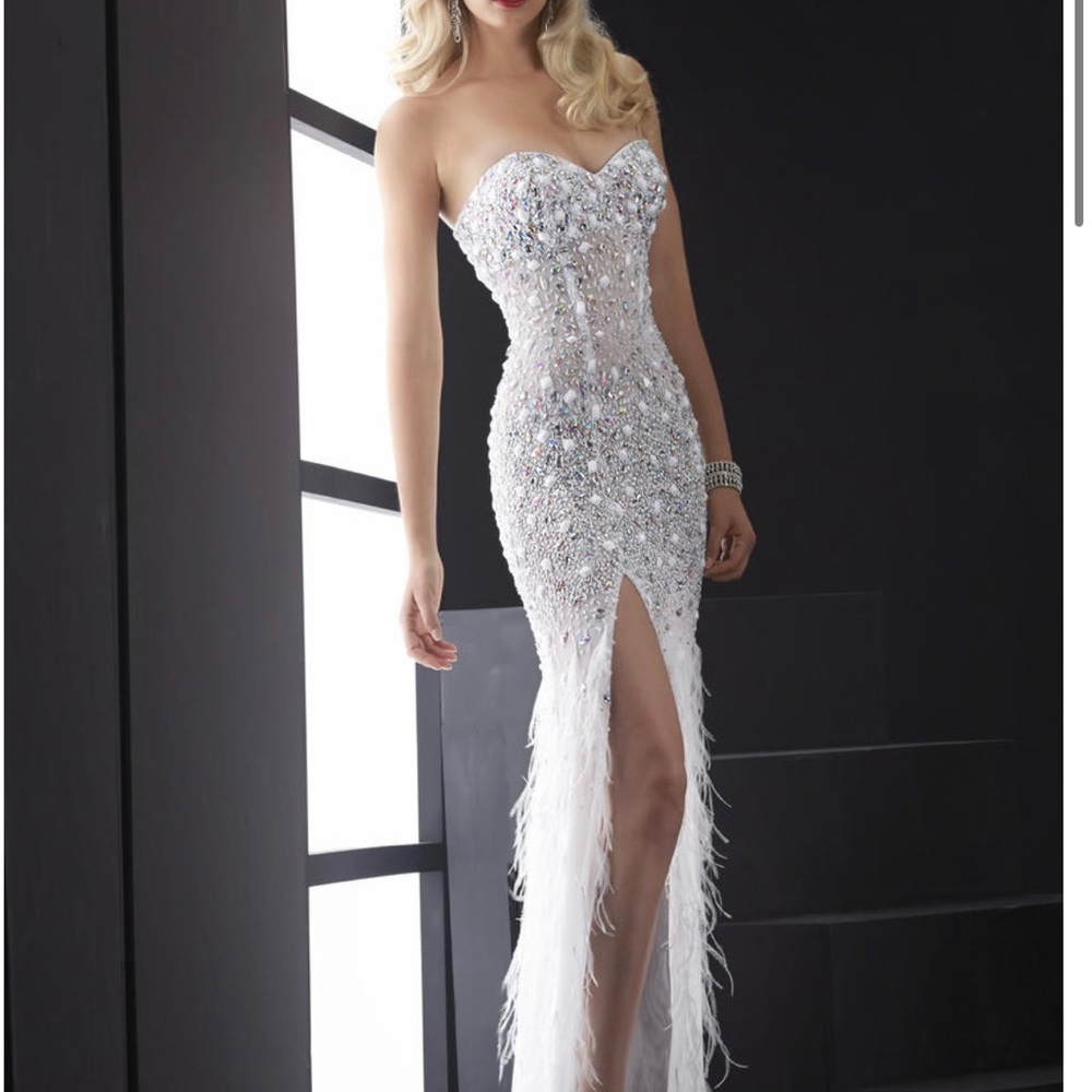 Breathtaking white beaded prom, pageant, or red carpet gown